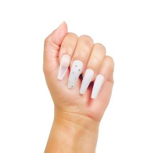 Long coffe nails white diamond.